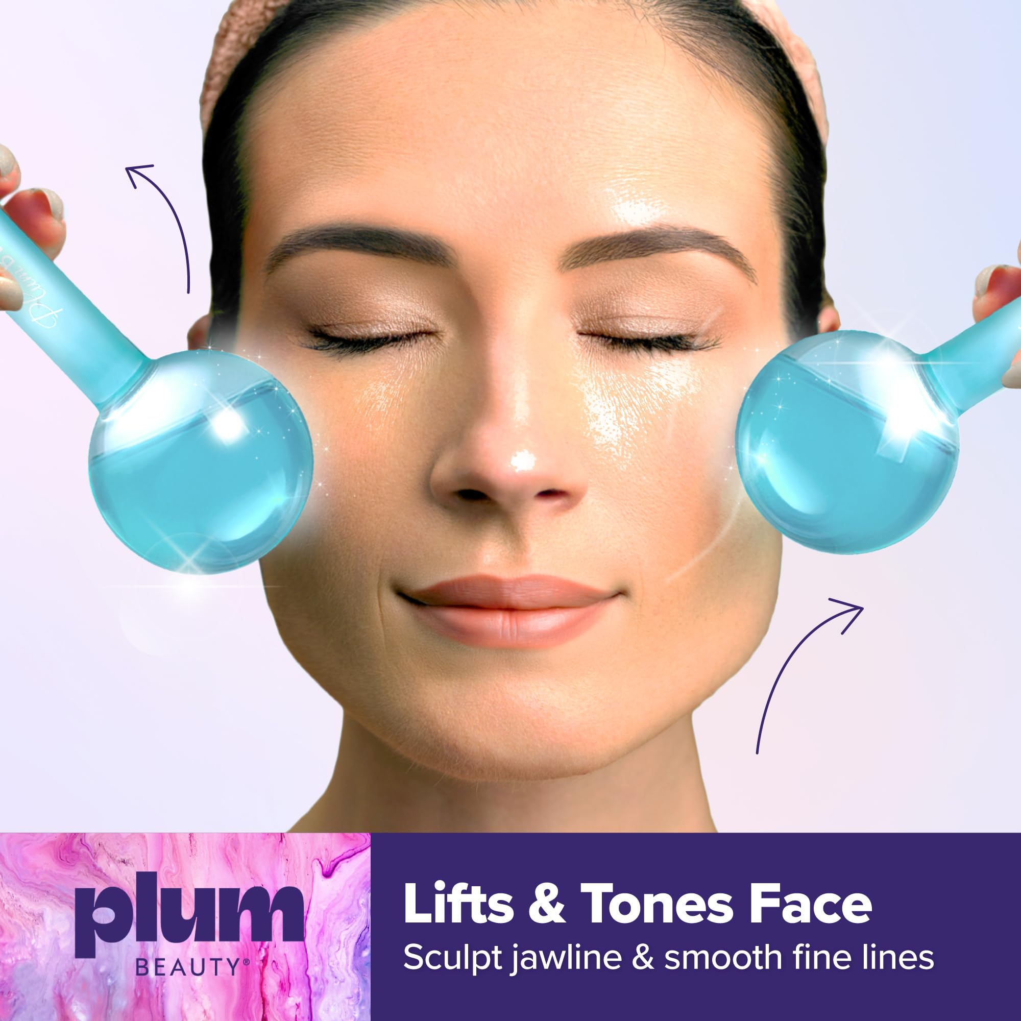 Demonstration of Plum Beauty cooling globes being glided along the jawline and cheekbones
