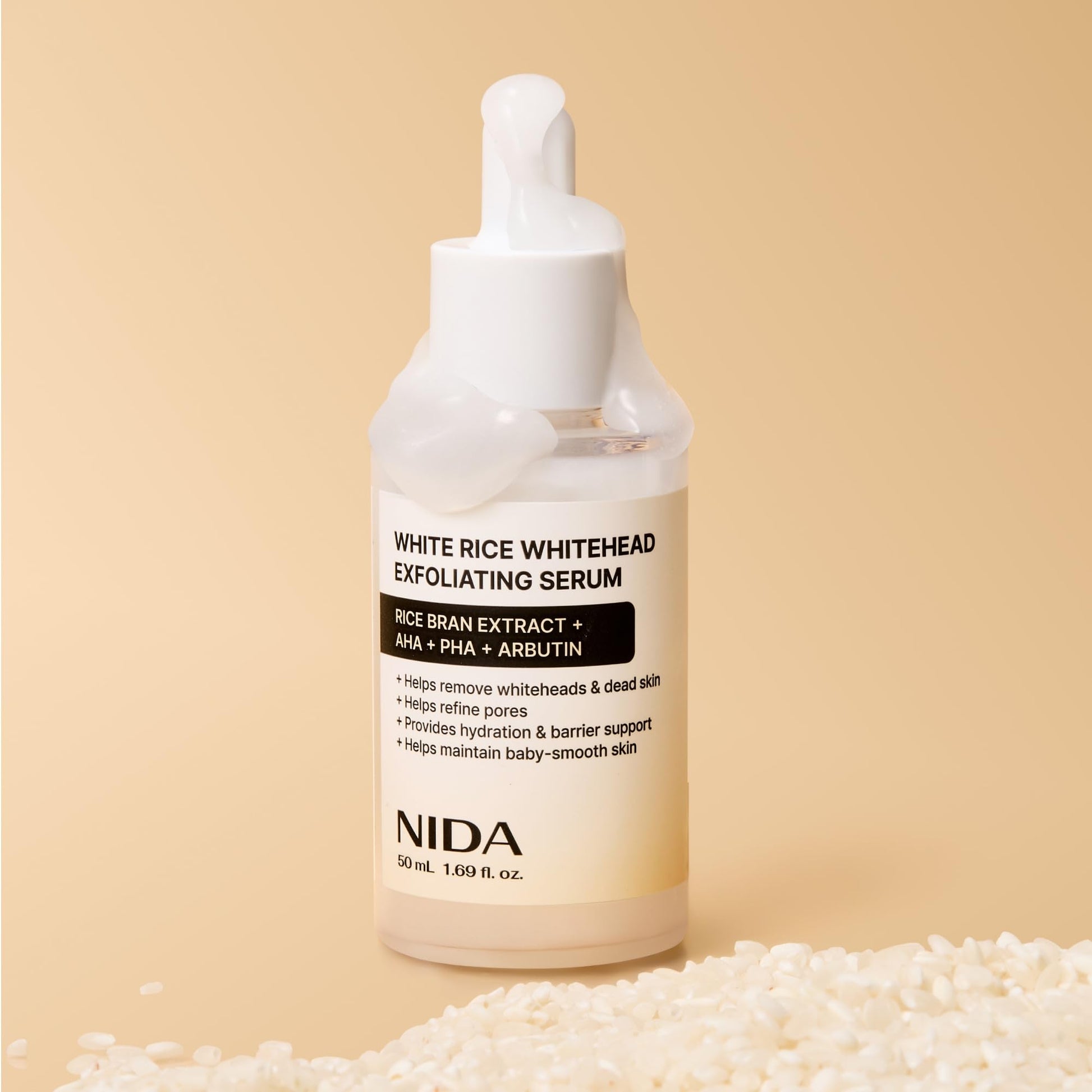 NIDA White Rice Whitehead Exfoliating Serum next to brand packaging box
