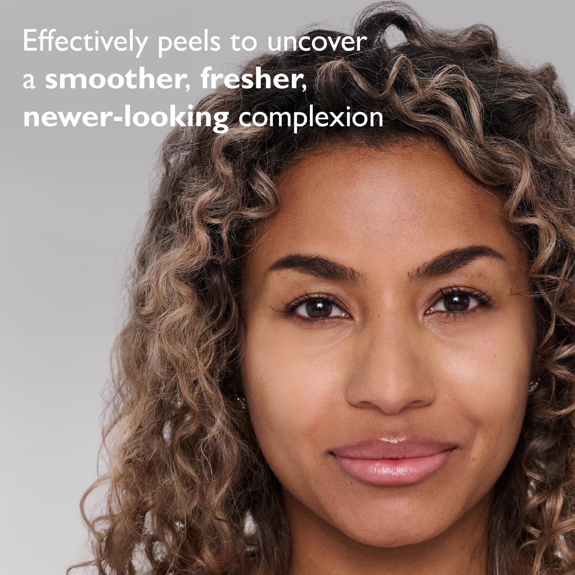 Peter Thomas Roth facial exfoliant gel being massaged on skin.