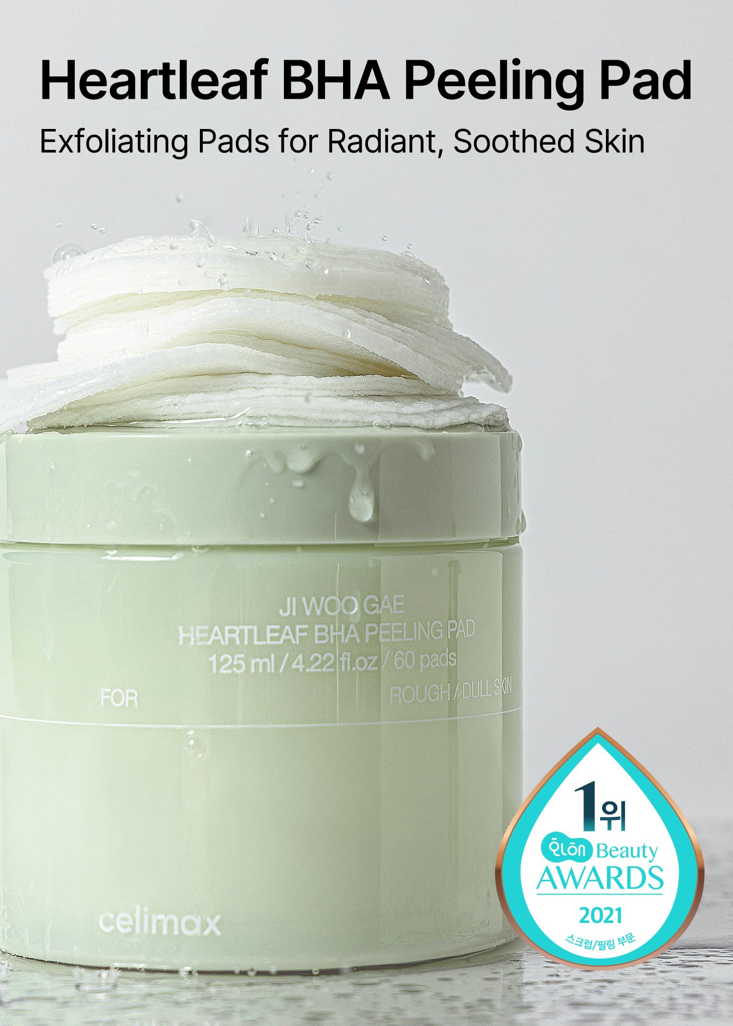 Celimax double-sided toner pad showing the embossed cotton texture for gentle facial wiping.