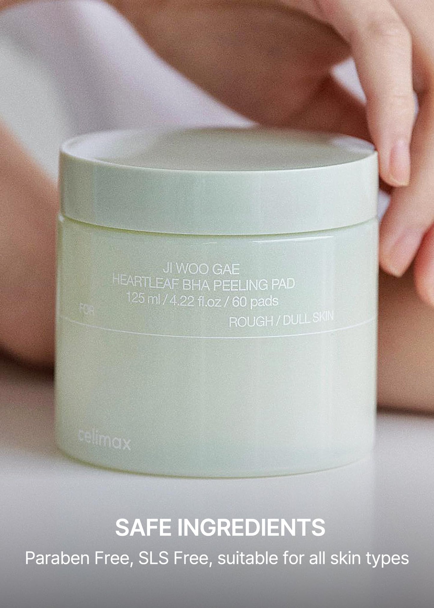 Authentic Celimax imported daily toner pad container placed alongside its protective outer product box.