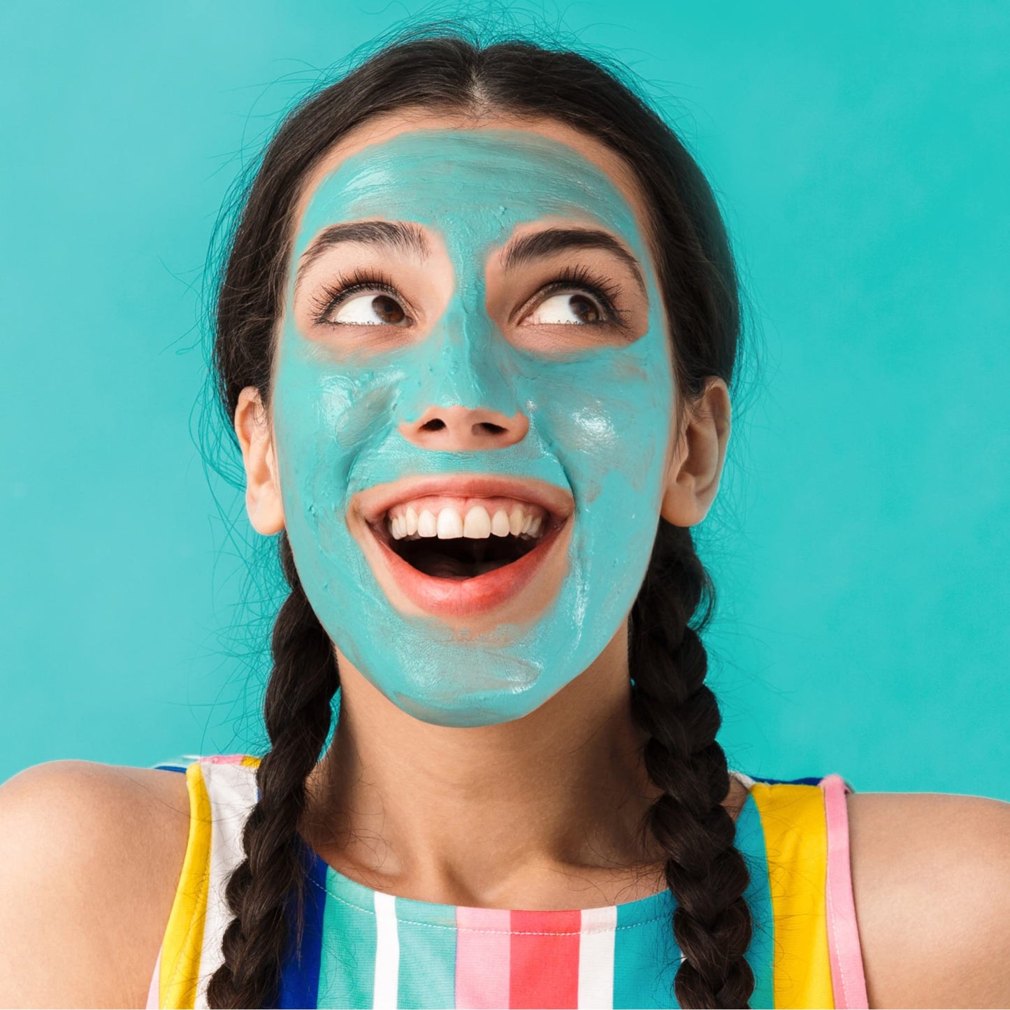 Person applying Freeman Dead Sea minerals face mask