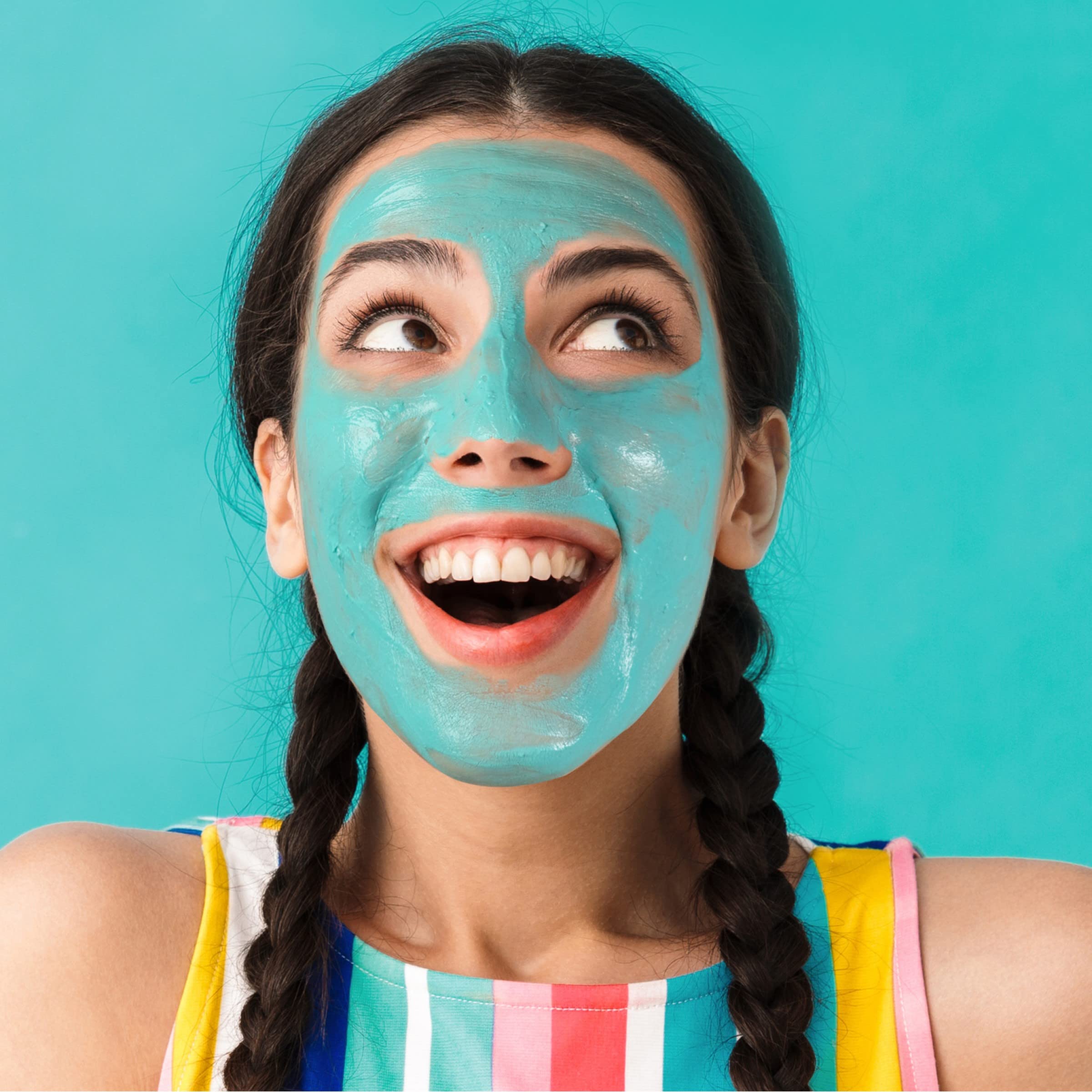 Person applying Freeman Dead Sea minerals face mask