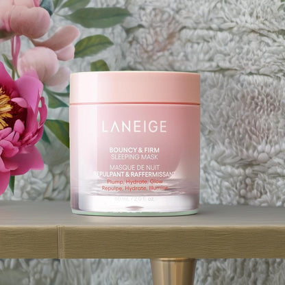 Applying Laneige bouncy and firm mask for facial contour massage