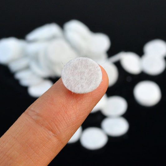Close up of 10mm circular facial vacuum replacement sponge filters