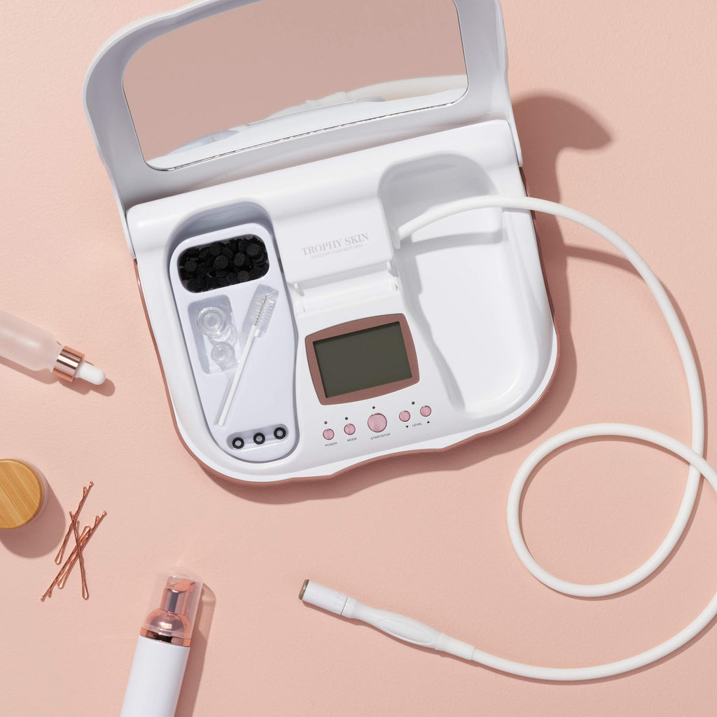 Trophy Skin skincare system box and included accessories layout