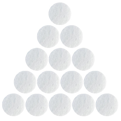 Close up view of a single ten millimeter white cotton filter replacement for facial vacuum suction machines.