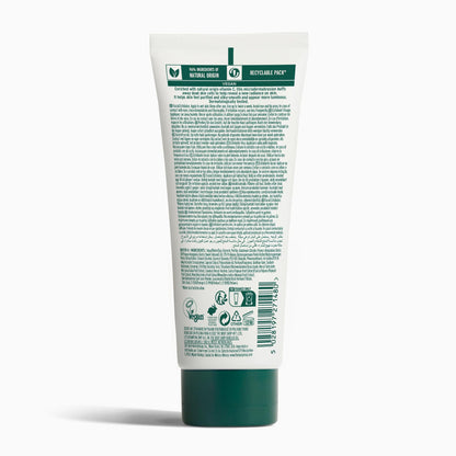 The Body Shop face scrub texture showing fine exfoliating micro-particles close up.