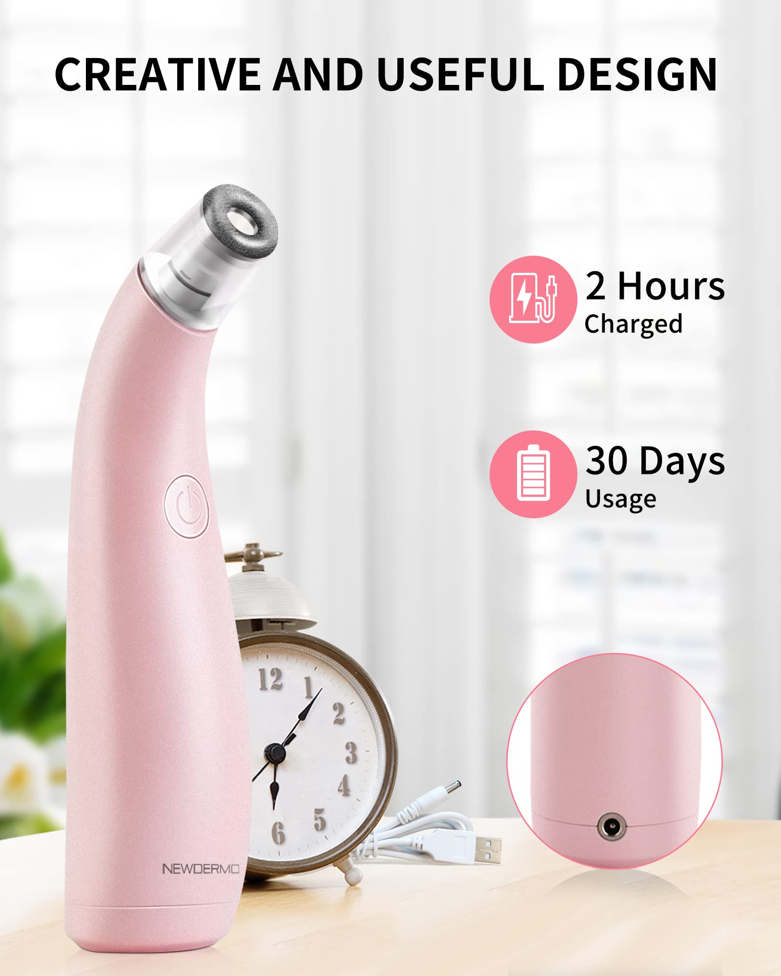 Side profile of the ergonomic pink NEWDERMO blackhead remover and skin exfoliation device