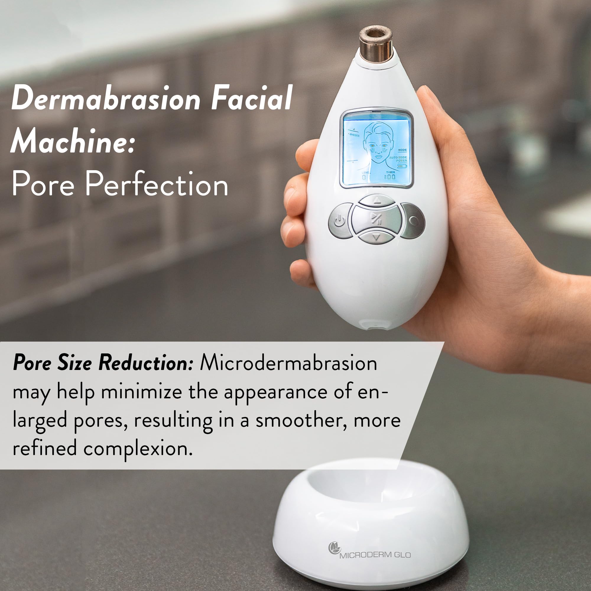 Microderm GLO diamond microdermabrasion system package contents including the charging base and replacement filters.