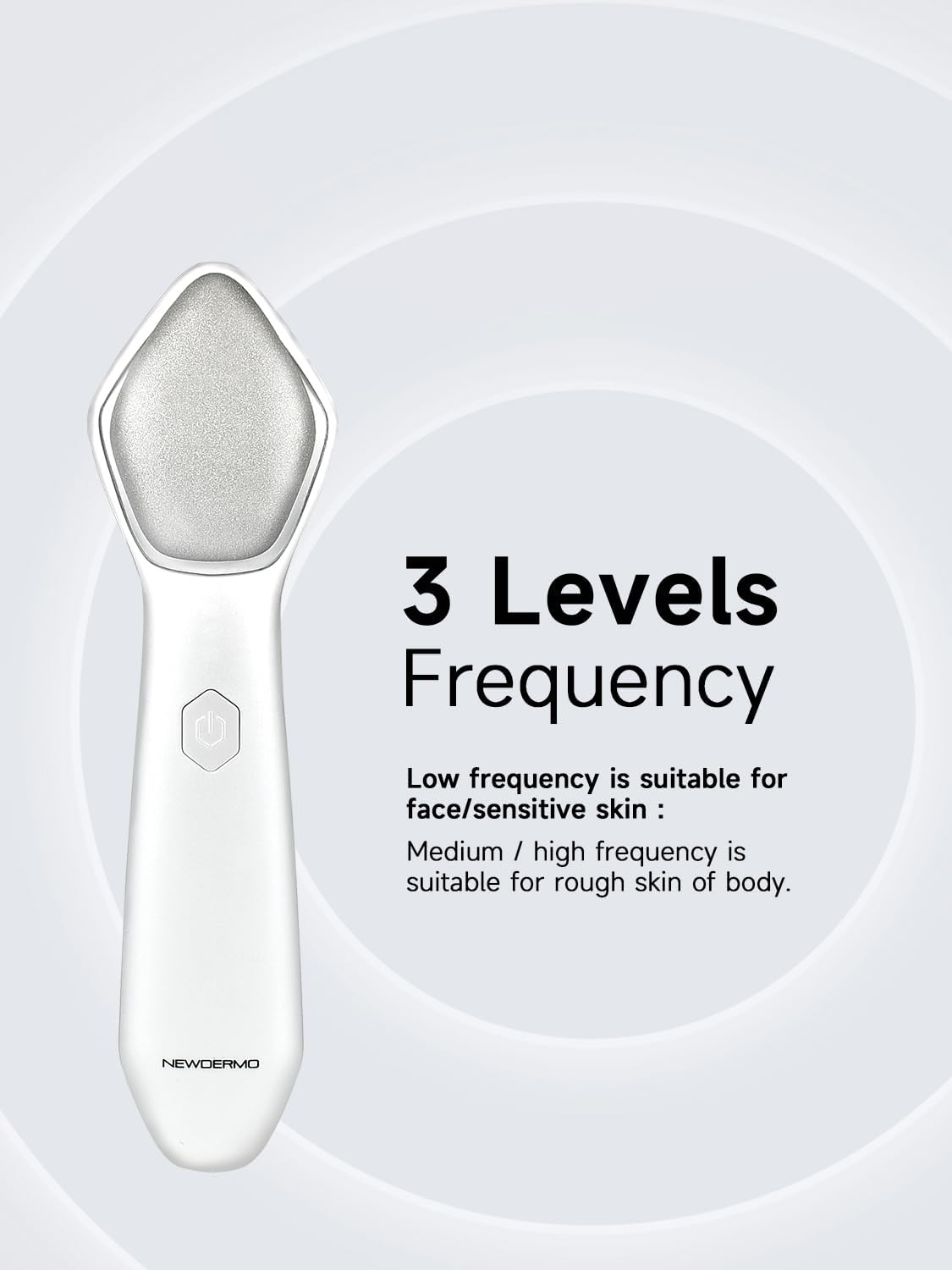 White NEWDERMO electric exfoliating machine being rinsed under water to demonstrate IPX6 waterproof rating.