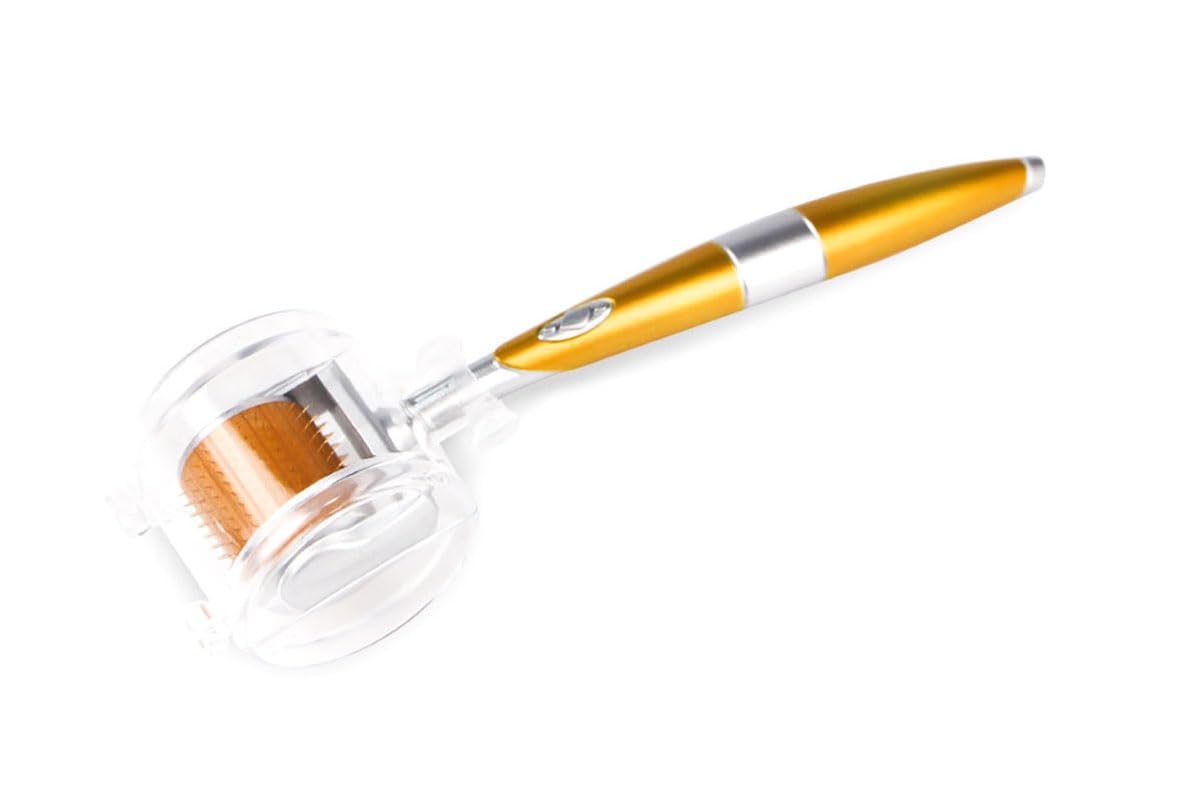 Gold plated titanium alloy microneedling roller close up highlighting real individual needles.