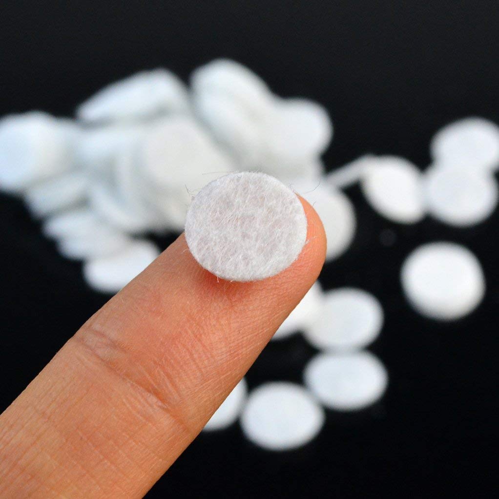 White replacement cotton facial vacuum filters suitable for professional salon extraction machines.