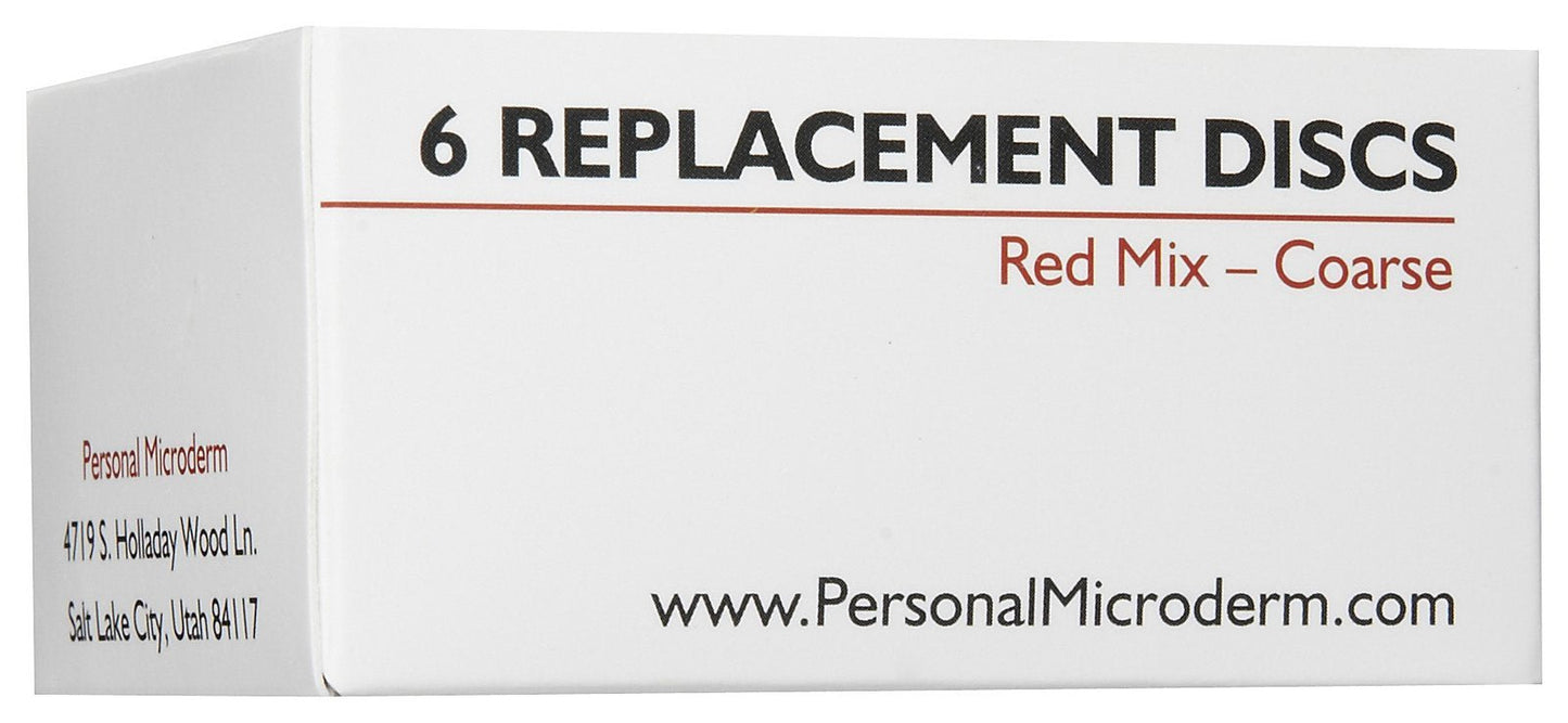 Six red microdermabrasion replacement tips and one black filter displayed together