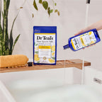 Pouring Dr Teal's foaming bath liquid to show rich bubble texture