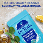 Pouring Dr Teal's pure magnesium sulfate crystals into warm bathwater.