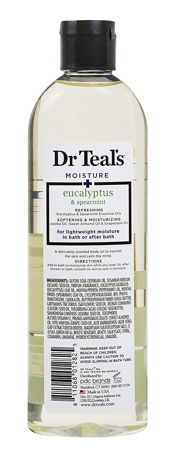 Close up view of the ingredients list on the back of Dr Teals bath oil packaging