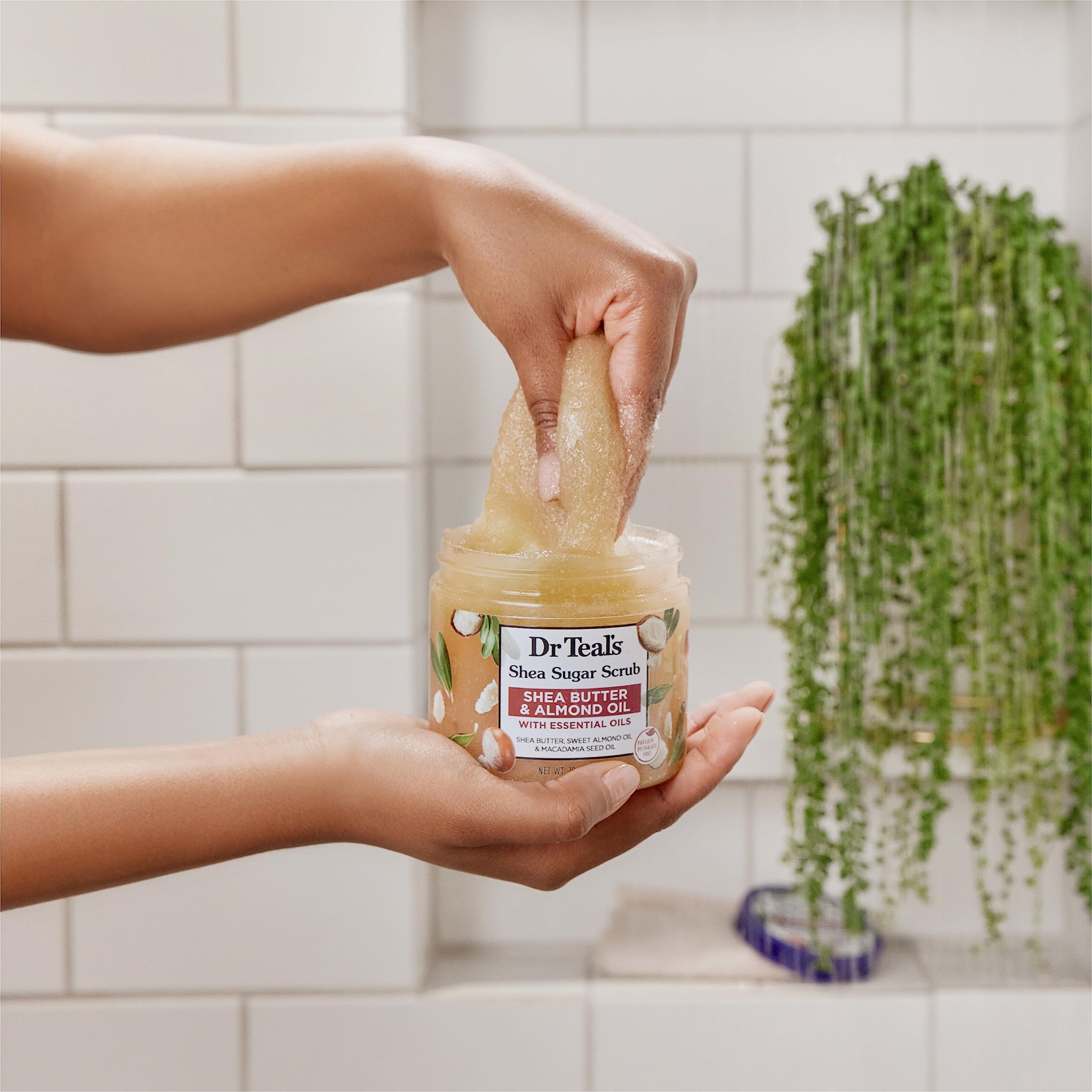 Close up view of the authentic imported Dr Teal's moisturizing body scrub container.