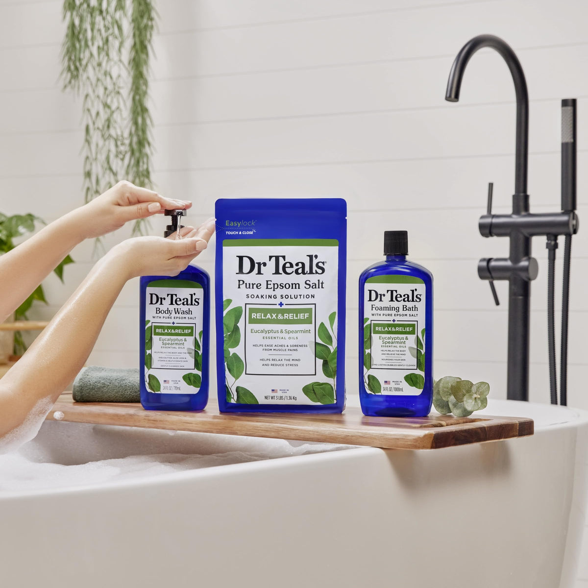 Lifestyle shot of Dr. Teal's body wash bottle placed in a modern bathroom setting.