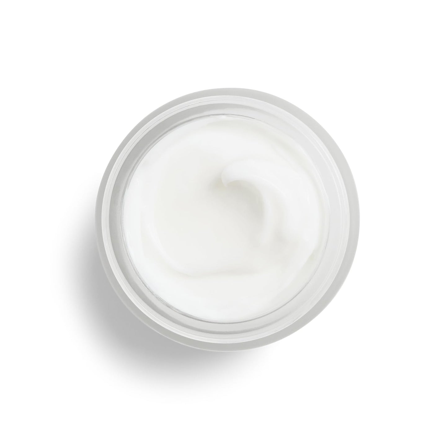 DHC skin renewing night cream placed on a clean vanity surface for nighttime routine