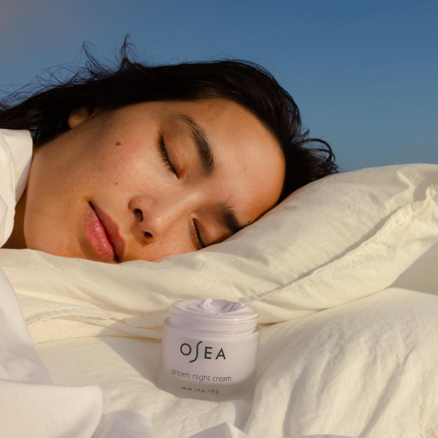 Premium imported OSEA hydrating night moisturizer jar placed on a clean background