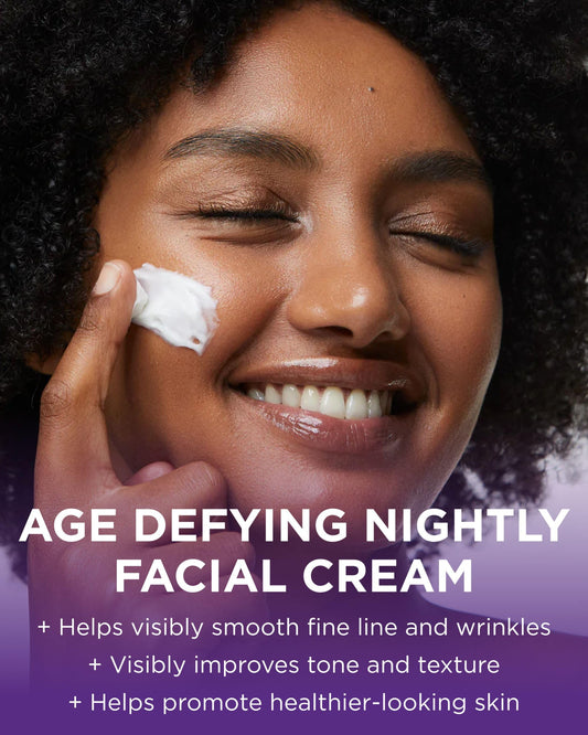 Andalou Naturals Age Defying night cream packaging box displaying non-GMO and cruelty-free certifications.