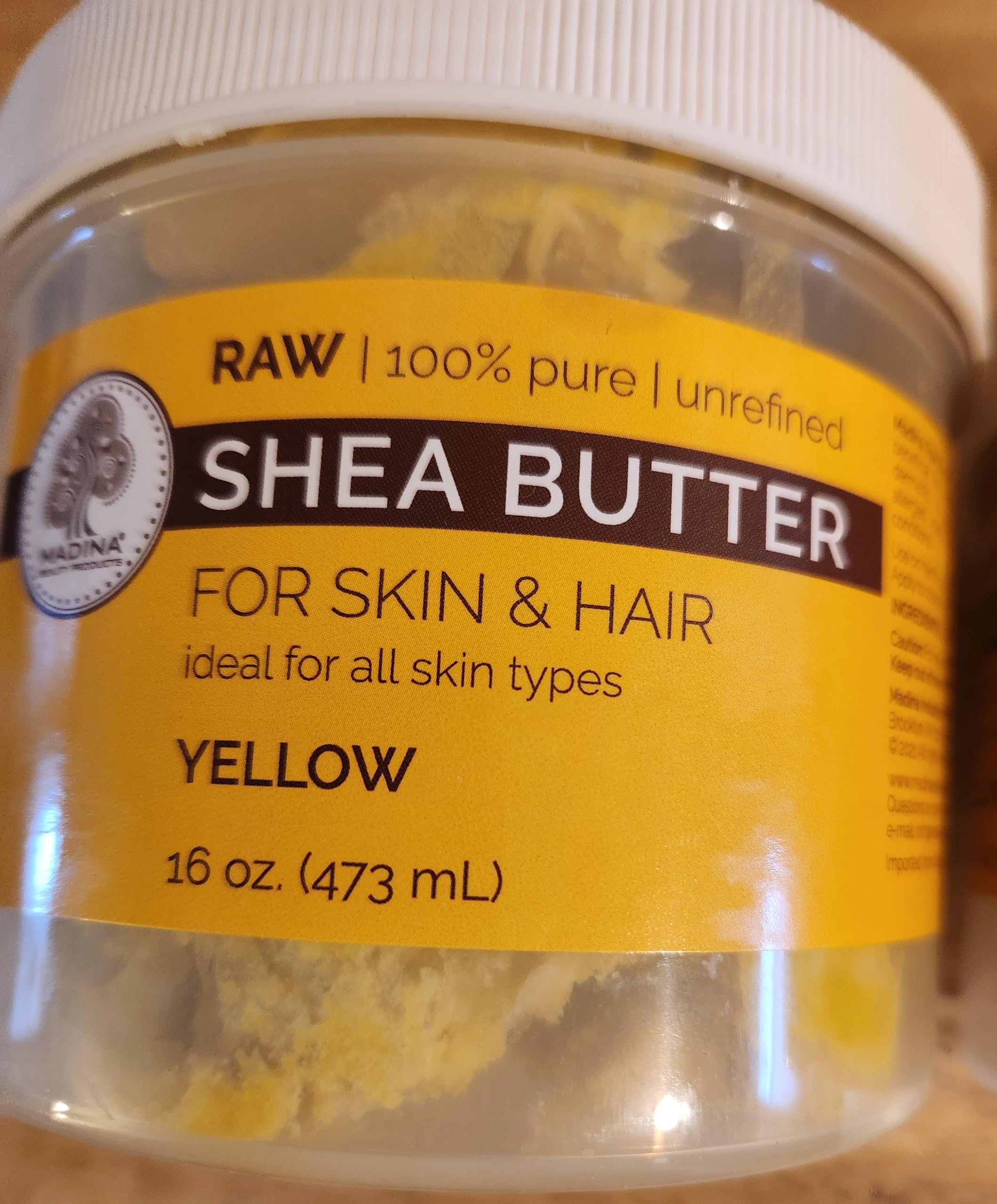 Aroma Depot yellow shea butter packaging for skin and hair care