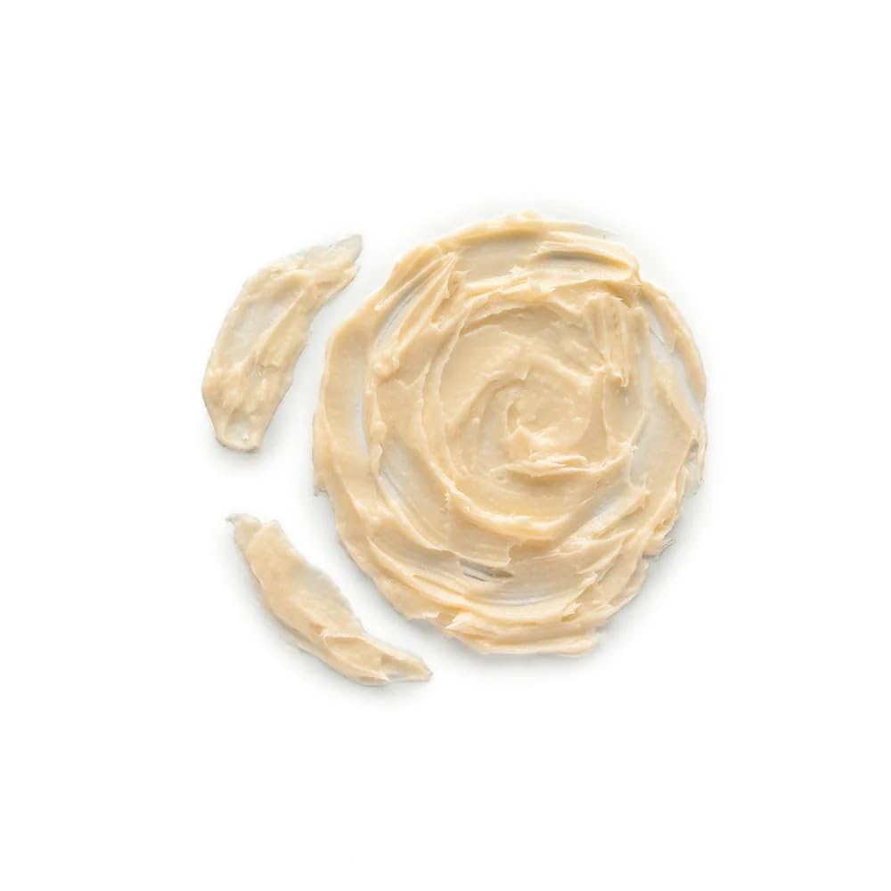 Colleen Rothschild Dual Action Face Scrub open packaging showing the creamy texture and enzyme particles.