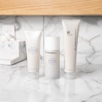 Nu Skin AgeLOC Dermatic Effects Polish lifestyle setting in a modern bathroom.
