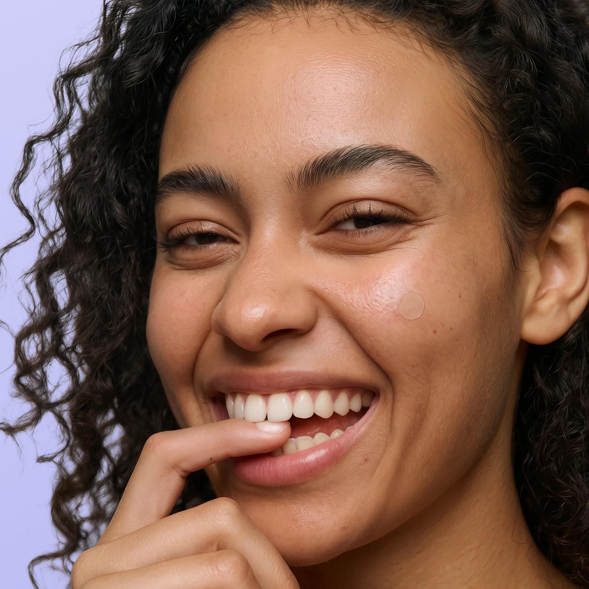 Close up of ultra thin translucent hydrocolloid blemish stickers for daytime breakout care