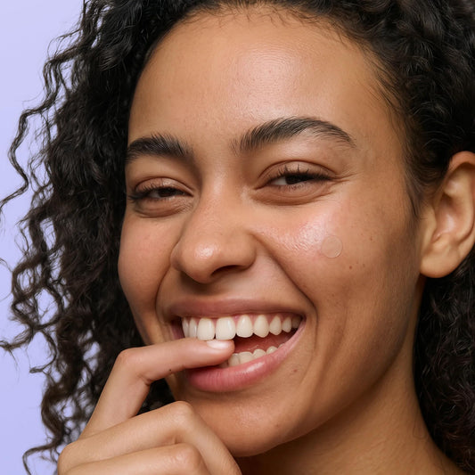 Close up of ultra thin translucent hydrocolloid blemish stickers for daytime breakout care
