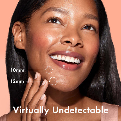 Rael invisible spot cover patch applied to facial skin demonstrating seamless blend and tapered edges.
