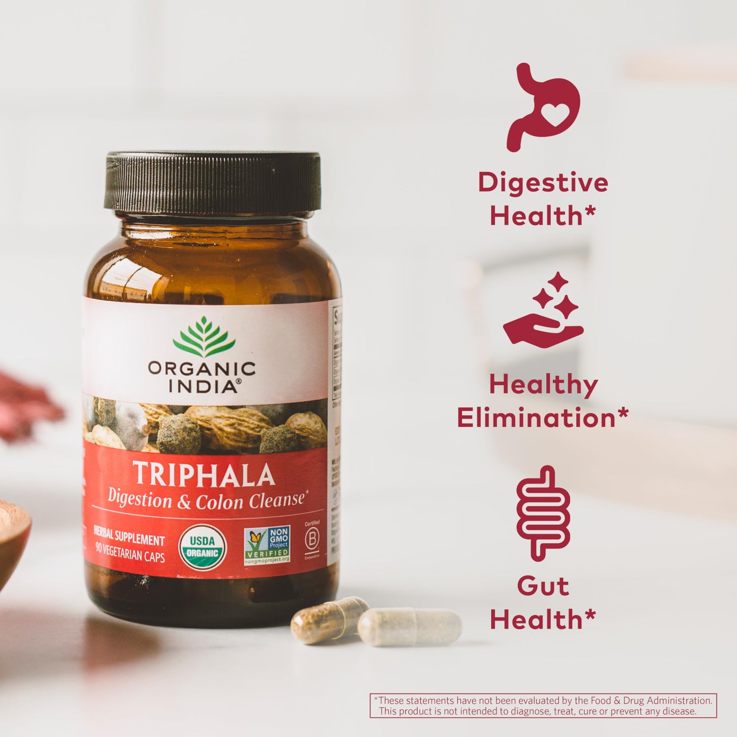 Organic India Triphala herbal supplement back label showcasing equal proportions of the three organic fruits