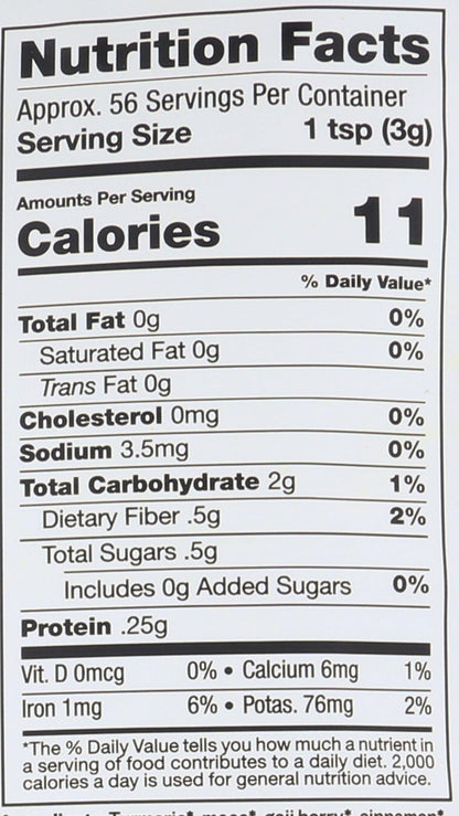 Six ounce pouch of Sunfood Superfoods Golden Milk powder displayed on a clean countertop.
