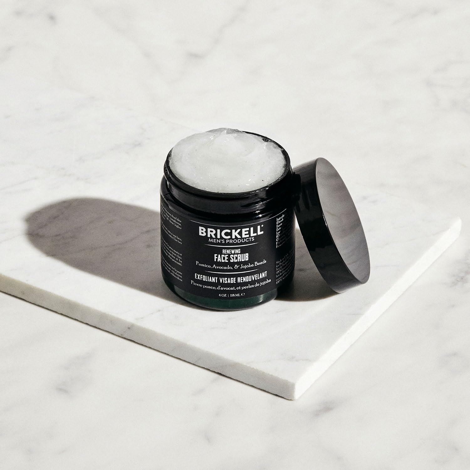 Premium Brickell men's renewing facial scrub for pre shave skin prep