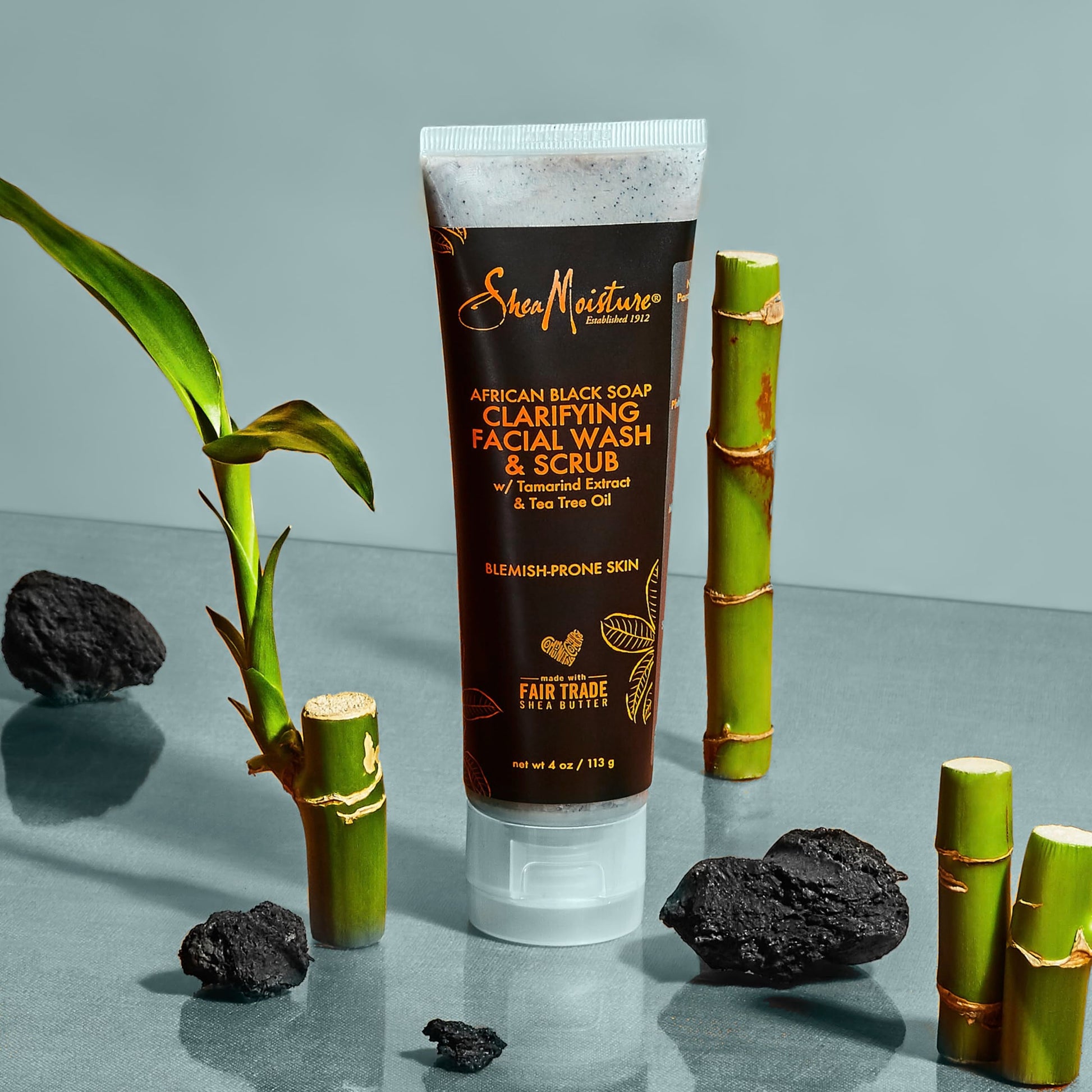 Skincare routine setup featuring SheaMoisture clarifying blemish wash product