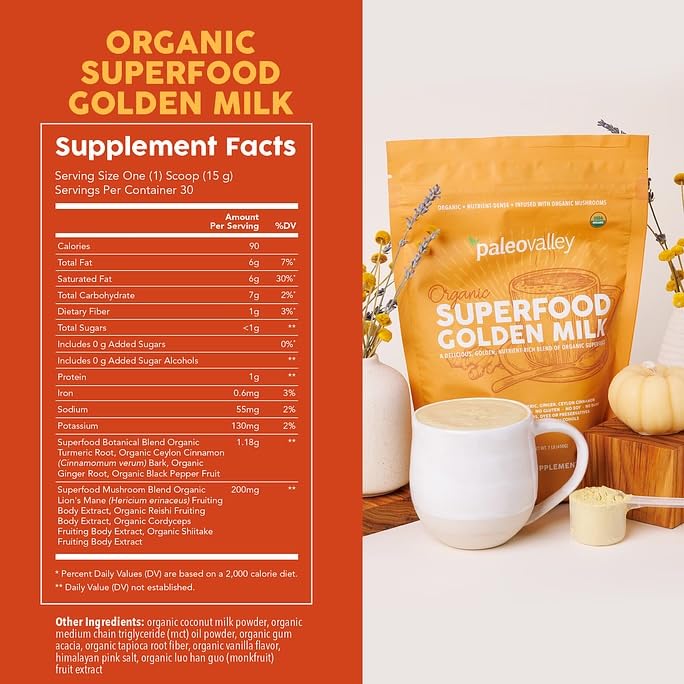 Paleovalley Golden Milk powder scoop showing organic turmeric blend texture