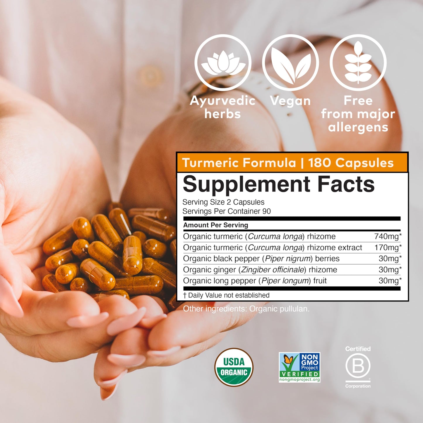 Side view of Organic India Turmeric formula glass bottle highlighting supplement facts