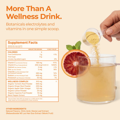 Scoop of citrus flavored wellness powder next to the product container