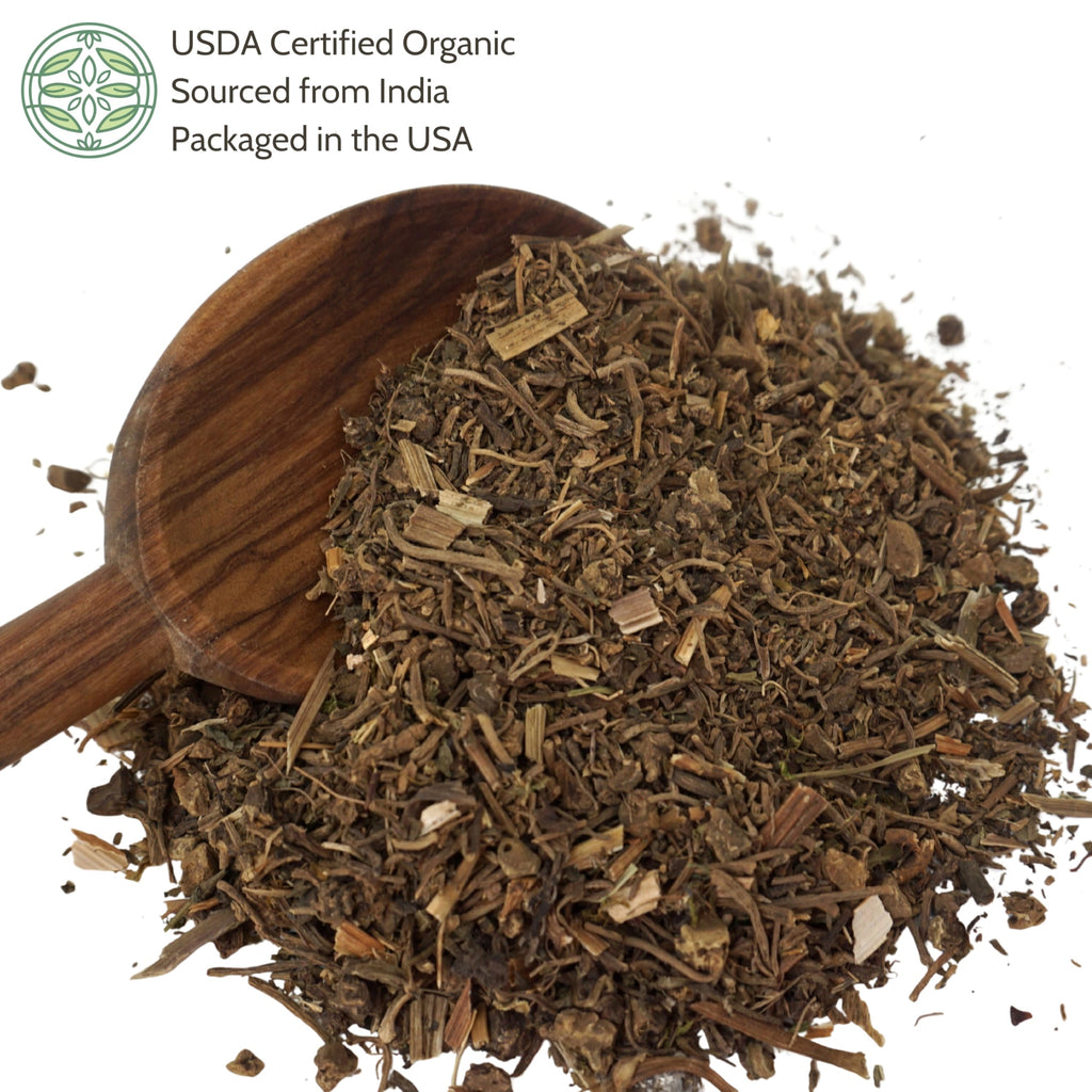 Close up of cut and sifted organic valerian root loose leaf herbal pieces showing natural dried texture.