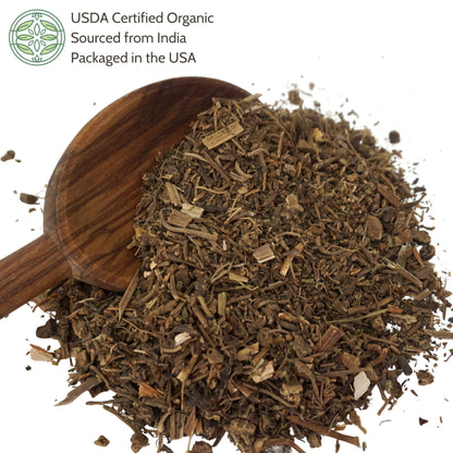Close up of cut and sifted organic valerian root loose leaf herbal pieces showing natural dried texture.