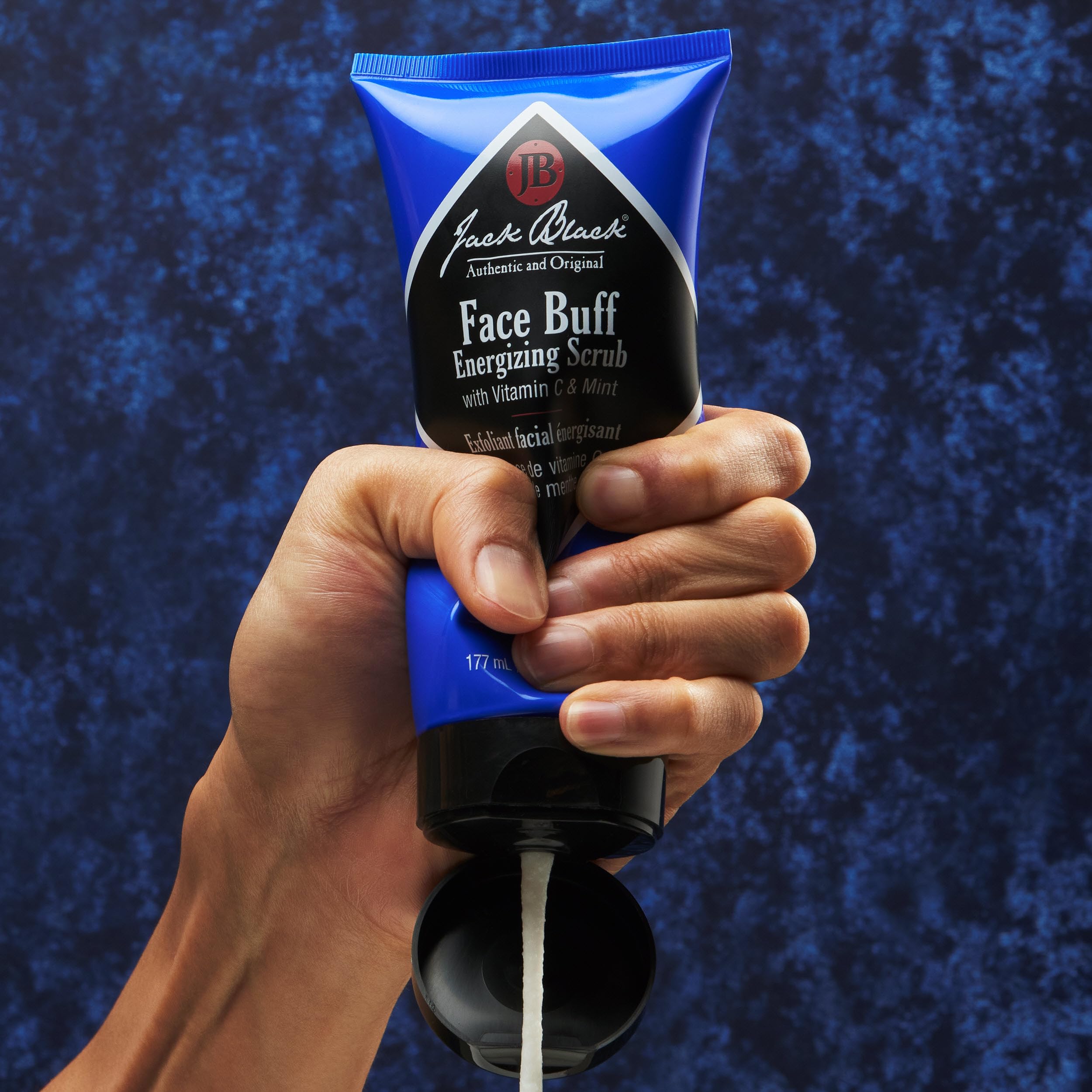 Jack Black pre shave facial exfoliator packaging detailing deep cleaning and skin prep benefits.