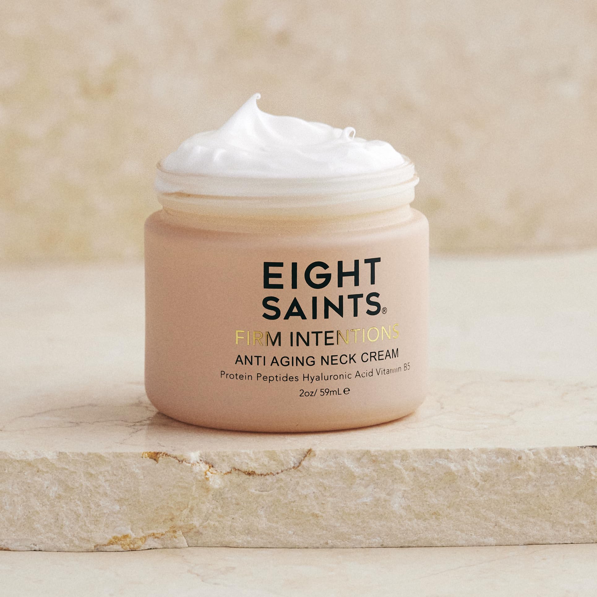 Eight Saints anti aging skin tightening neck cream container showing natural ingredients