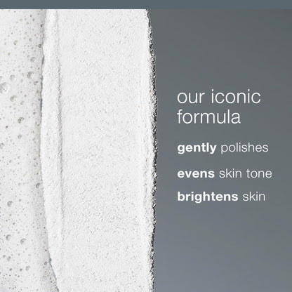 Dermalogica powder exfoliator bottle close up on white background.