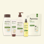 Side profile of Aveeno body oil spray bottle showing product volume and details