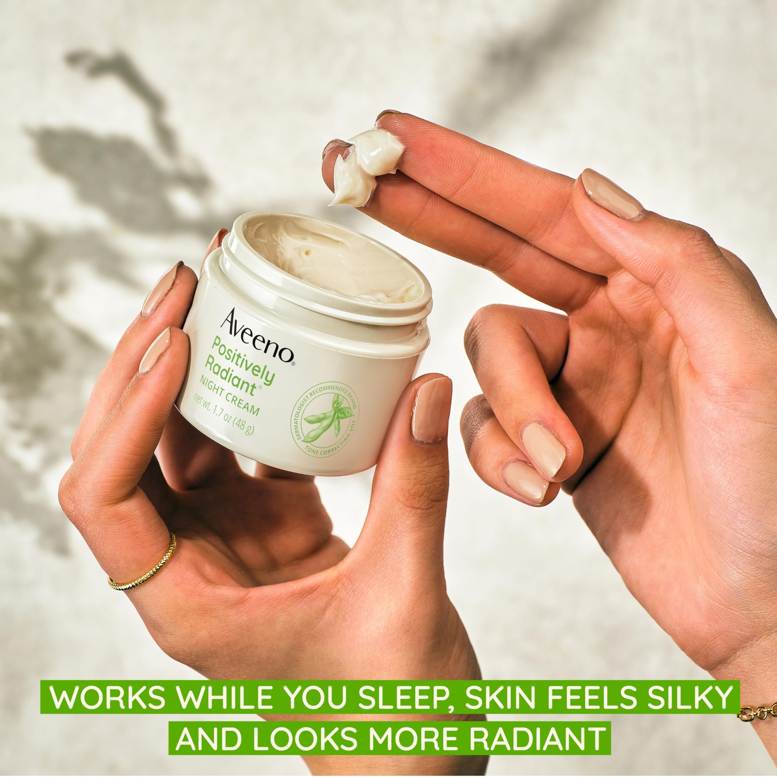 Close up of Aveeno night cream texture showcasing intensive moisture consistency