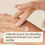 Fragrance free Aveeno healing ointment container showcasing multi use application details for body and face