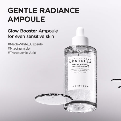 SKIN1004 Tone Brightening Capsule Ampoule showing the clear glass skin serum texture with visible micro-beads