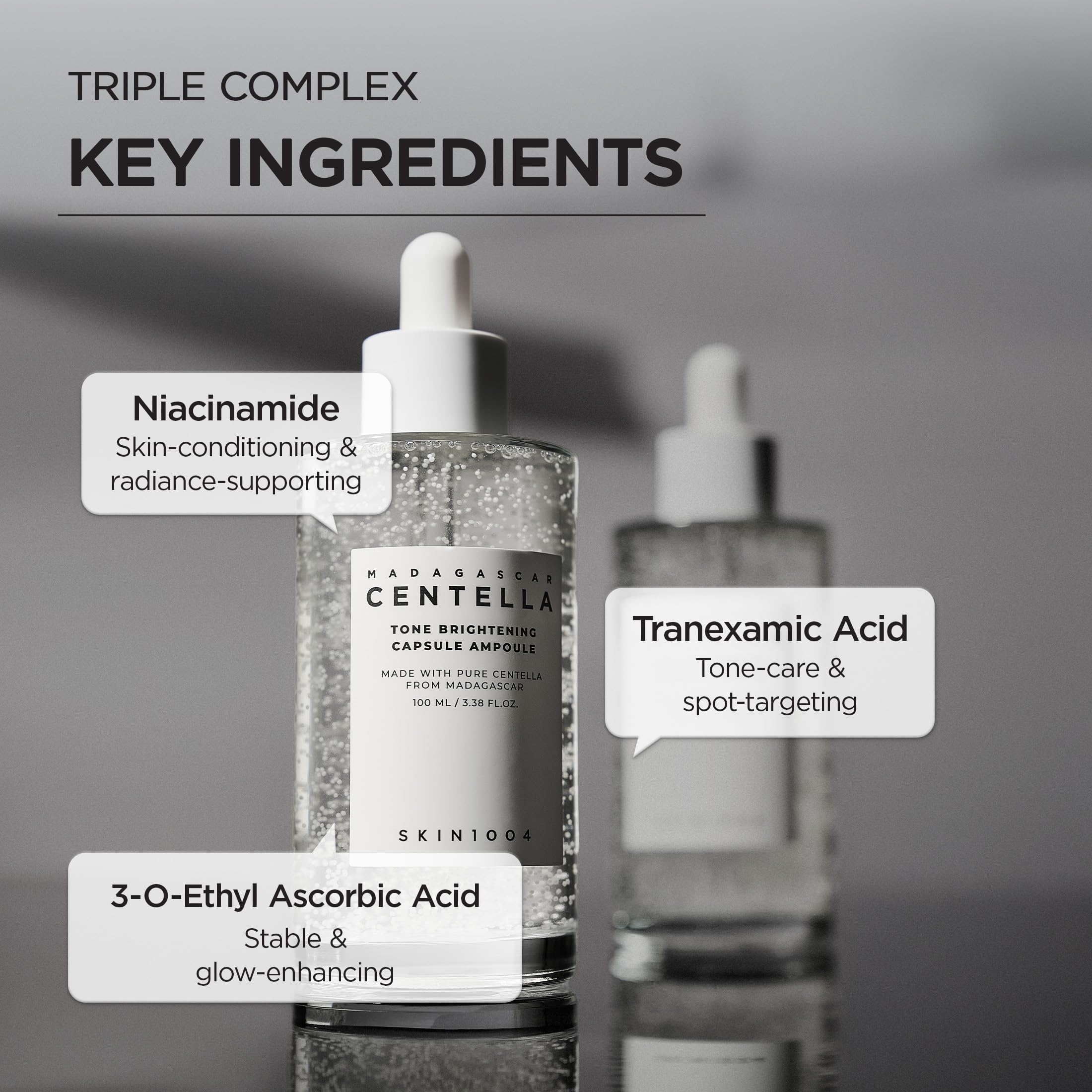 SKIN1004 Niacinamide and Tranexamic Acid serum bottle with packaging box highlighting authentic ingredients