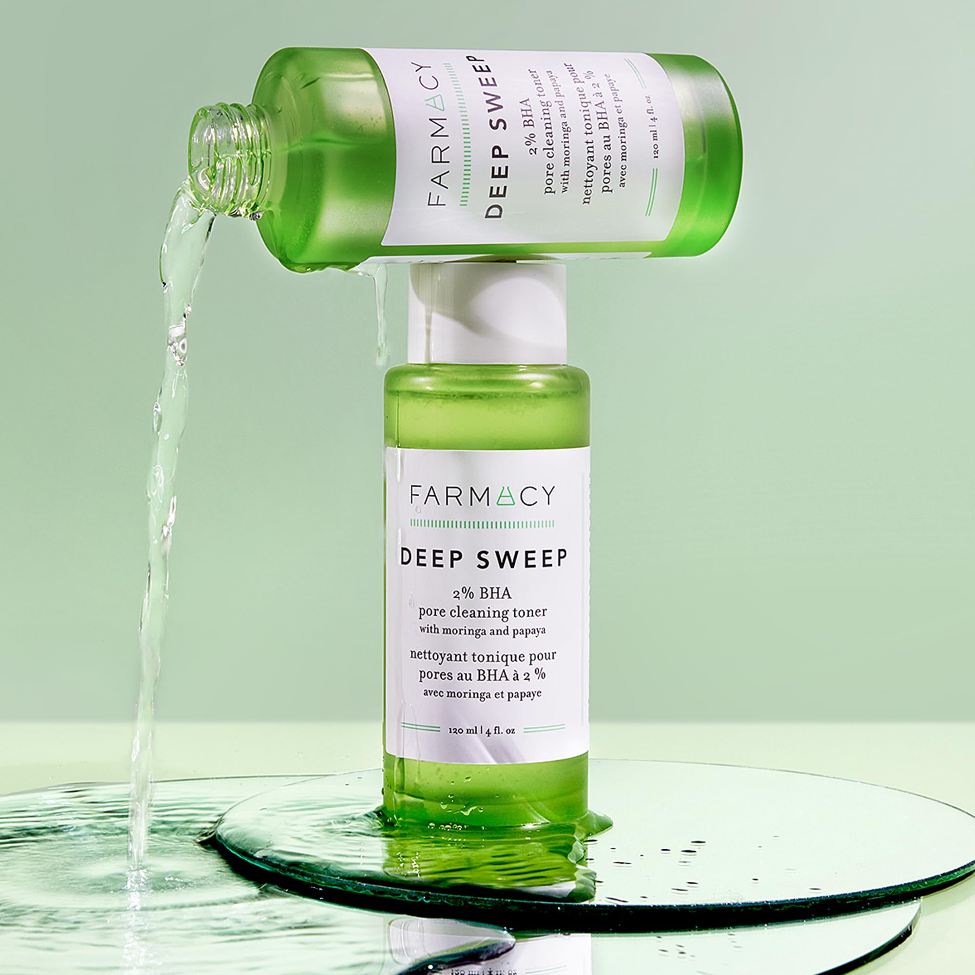Farmacy BHA liquid exfoliant and pore cleaner bottle showing product texture and green formula
